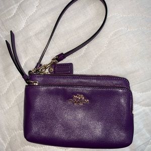 Bright purple Coach clutch